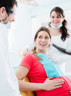 Sensibilidade nos dentes durante a gravidez: como tratar?